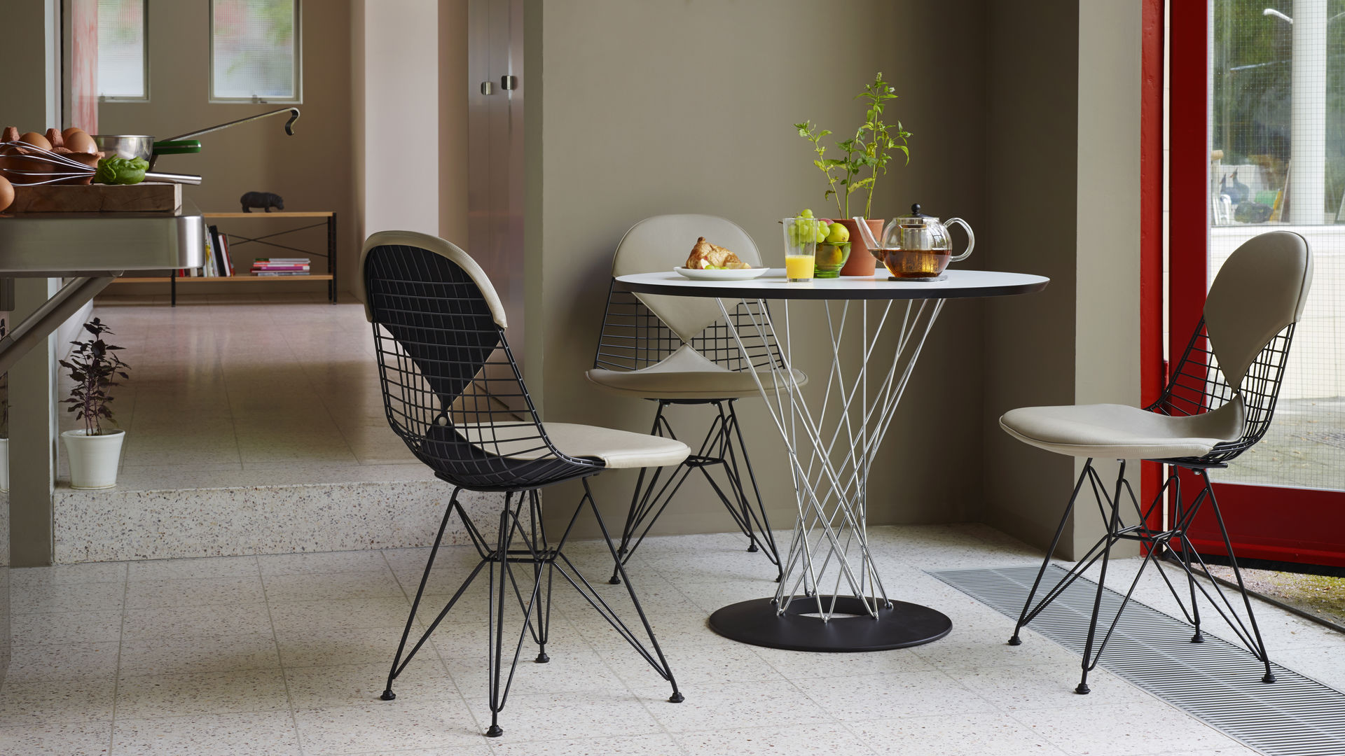 Vitra DKR-2 Chairs and Noguchi Dining Table